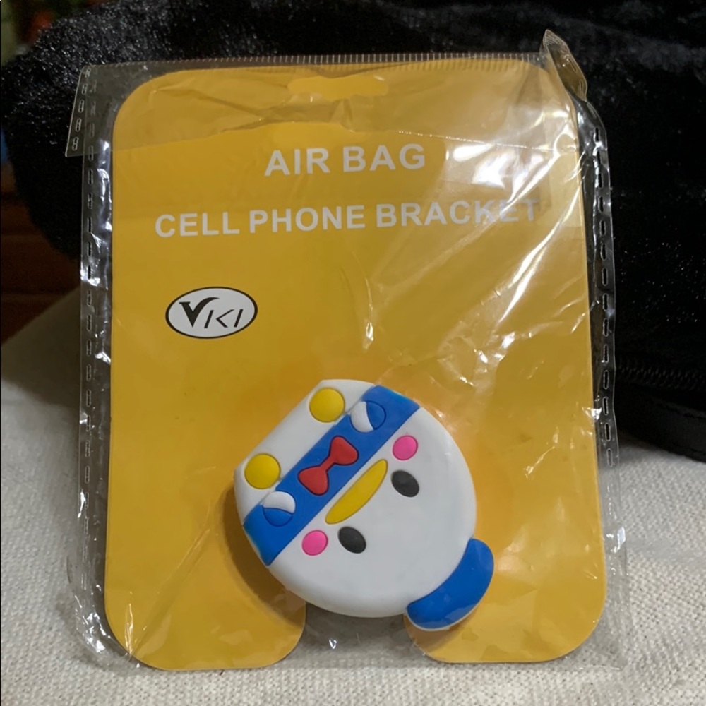 Baby Donald Duck Cell Phone Bracket. New in Packaging